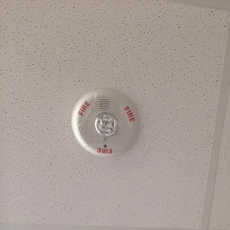 2M Technology installation of fire alarm system strobe light on ceiling
