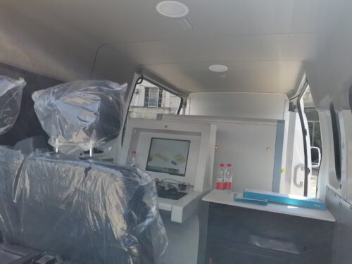 interior of vehicle mounted with 2M Technology 2MX-6550M mobile baggage and parcel x-ray scanner