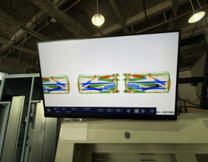x-ray image of luggage on monitor from 2M Technology baggage and parcel x-ray machine with AI software
