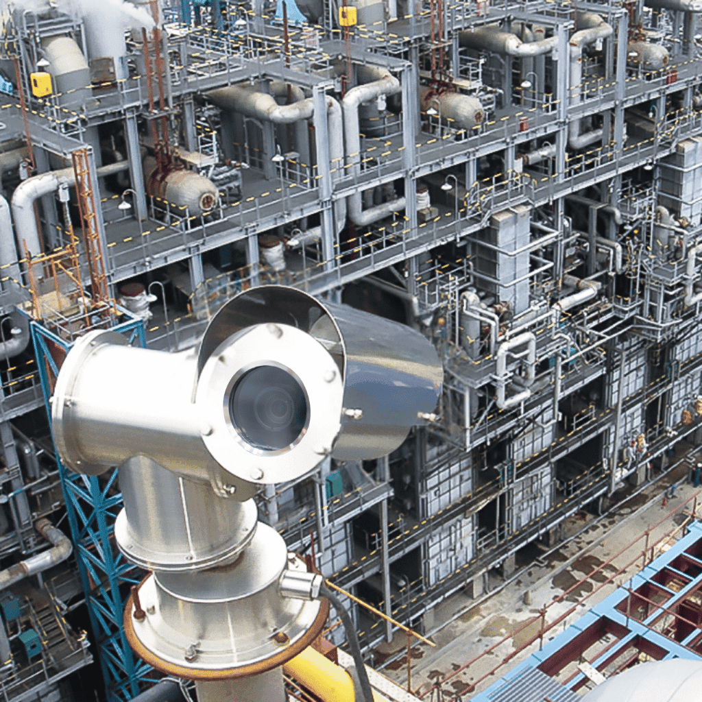 pole mounted explosion proof camera overlooking industrial area, explosion proof geovision housing