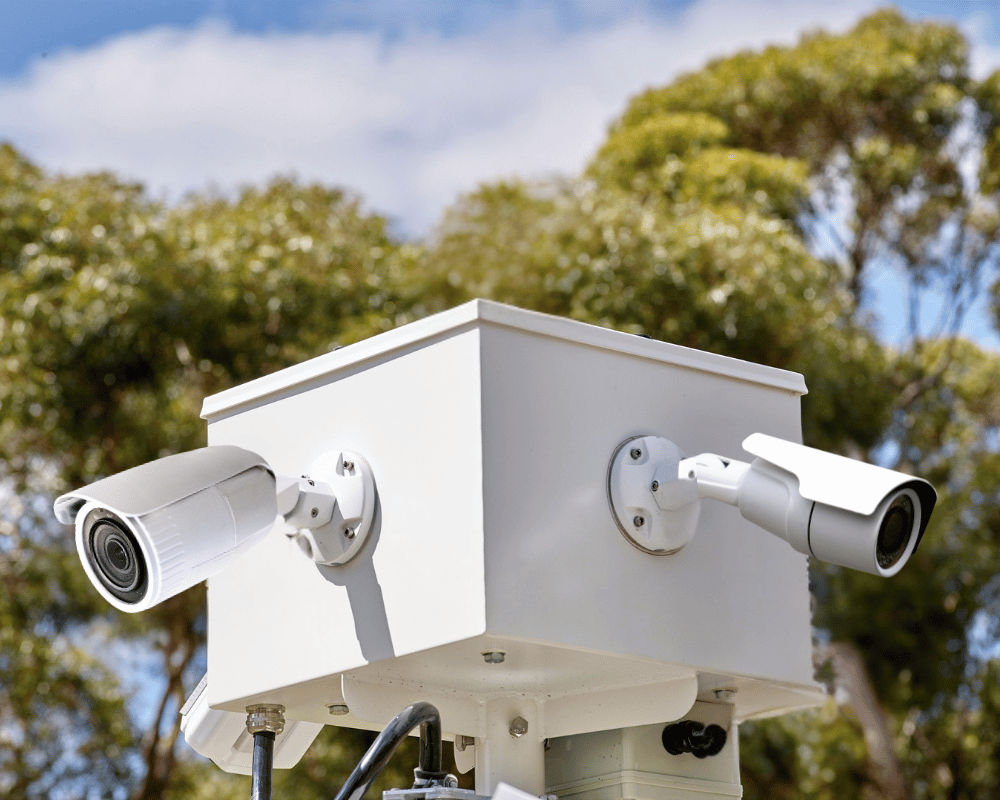 various bullet cameras mounted on solar security trailer mast