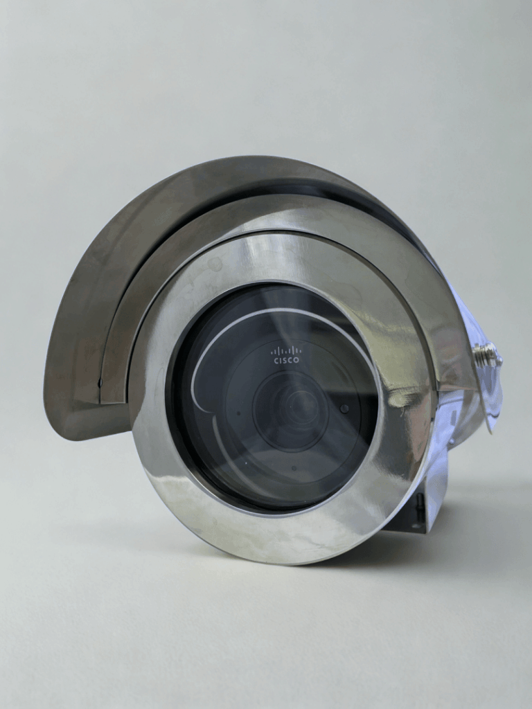 Closeup of Cisco Meraki MV53X bullet camera lens inside a custom explosion-proof camera housing from 2M Technology