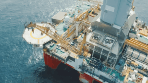 Aerial view of an offshore seadrilling rig platform and ocean