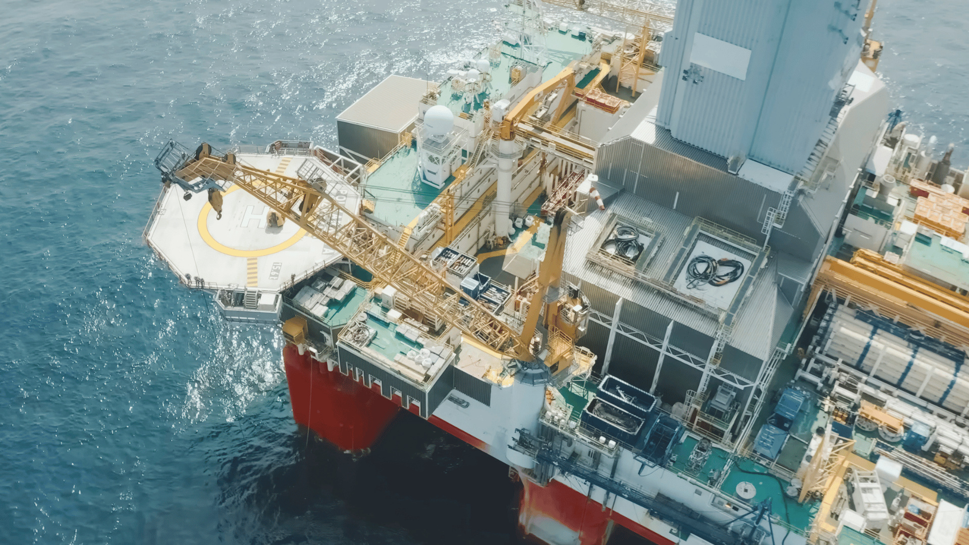 Aerial view of an offshore seadrilling rig platform and ocean
