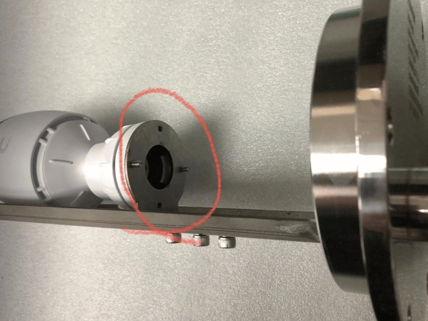 Closeup of custom explosion-proof mounting plate on Ubiquiti UniFi G6 bullet camera