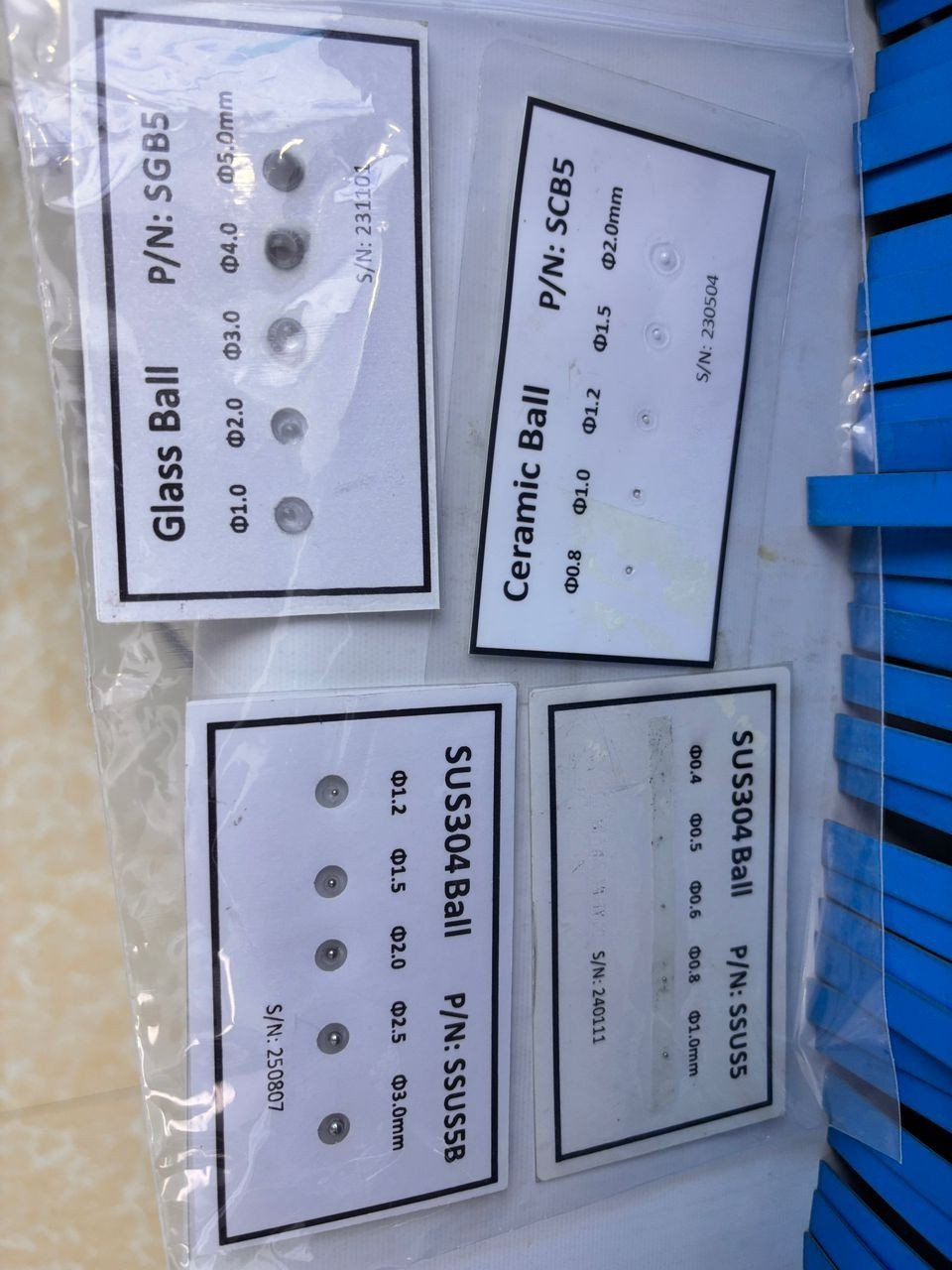 X-ray contaminant detection validation test spheres — SUS304 stainless steel, ceramic, and glass balls of varying sizes from 0.4mm to 5mm