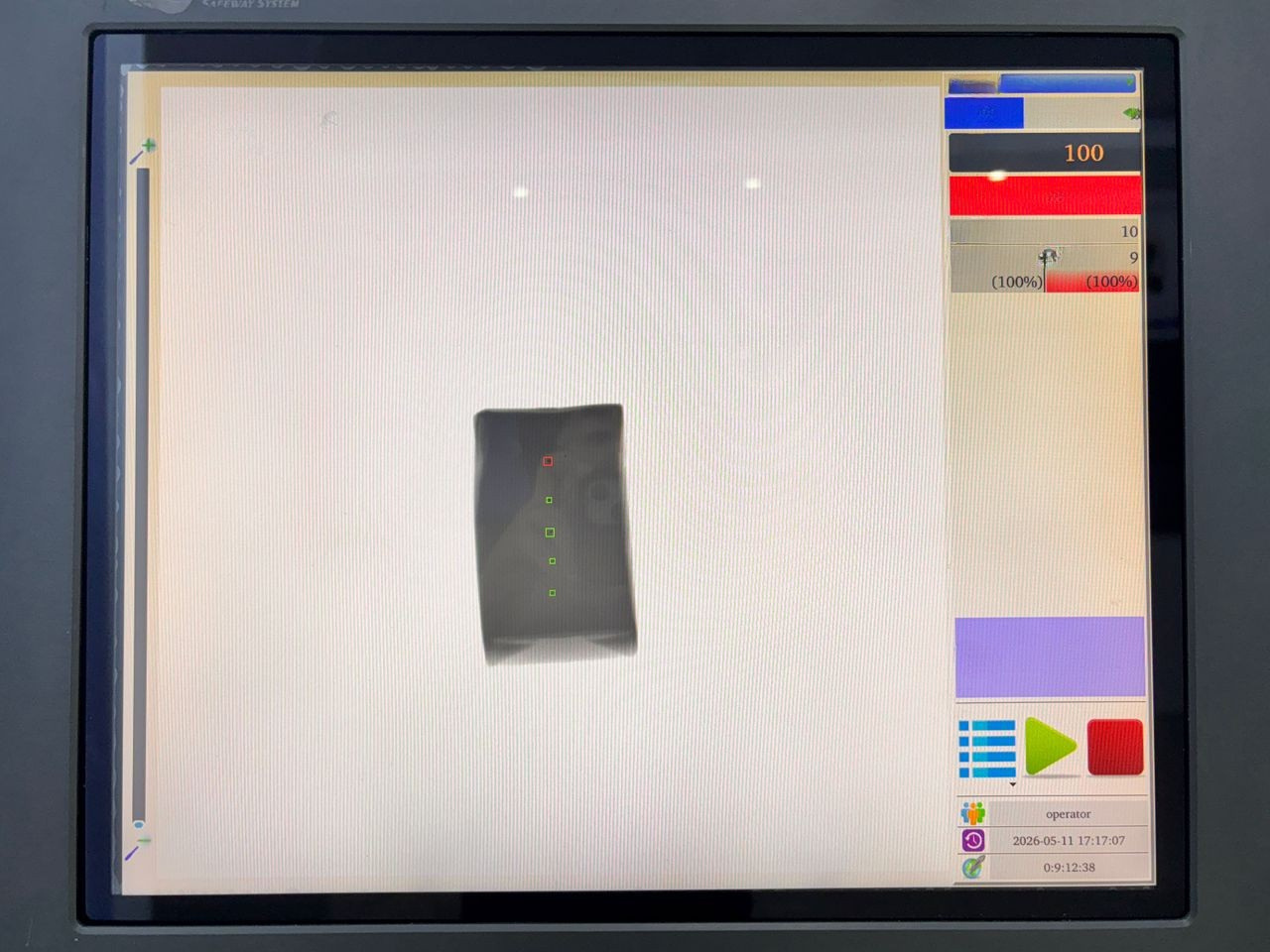 Single juice cup X-ray inspection scan showing detection markers for foreign body contaminant identification