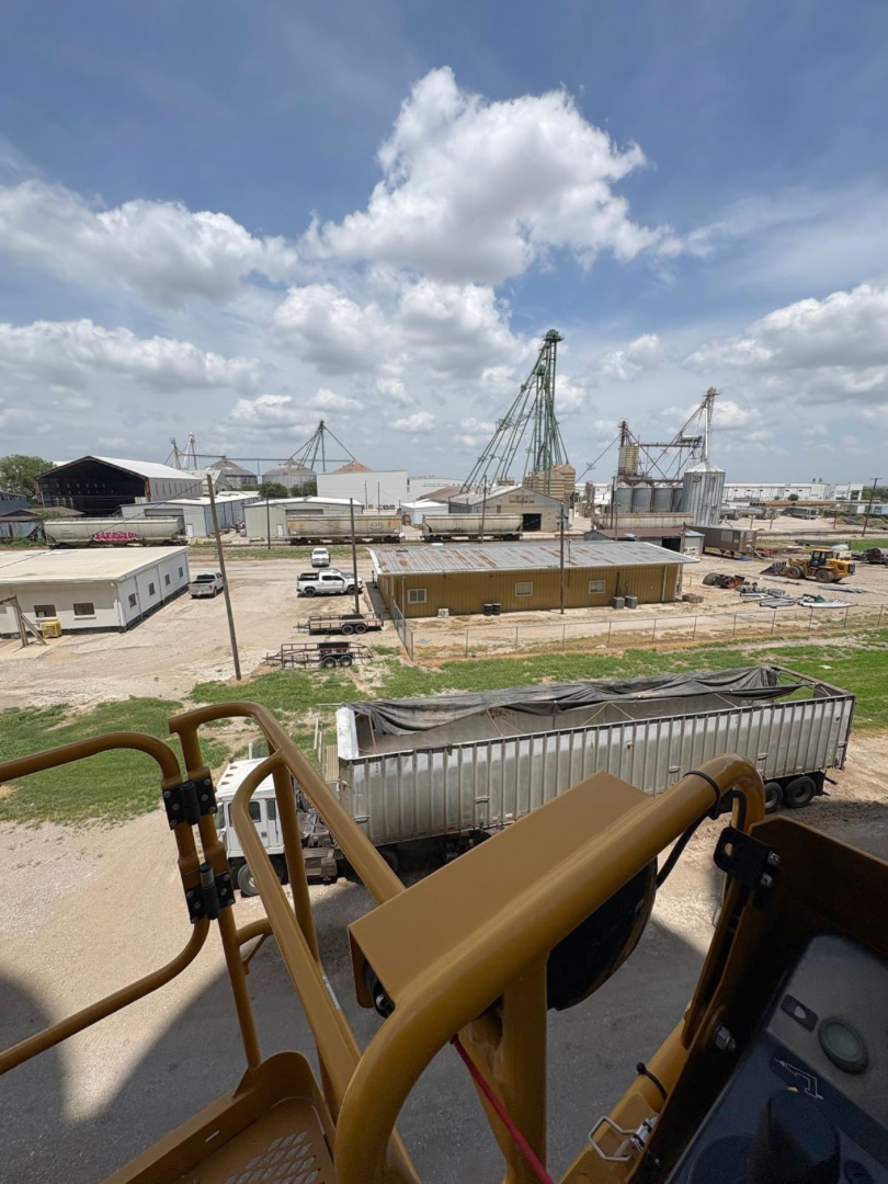 Grain loading trucks at grain silo