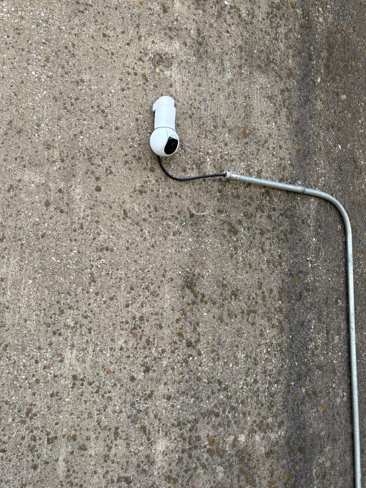 Closeup of Ubiquiti UniFi G6 PTZ at grain silo camera installation