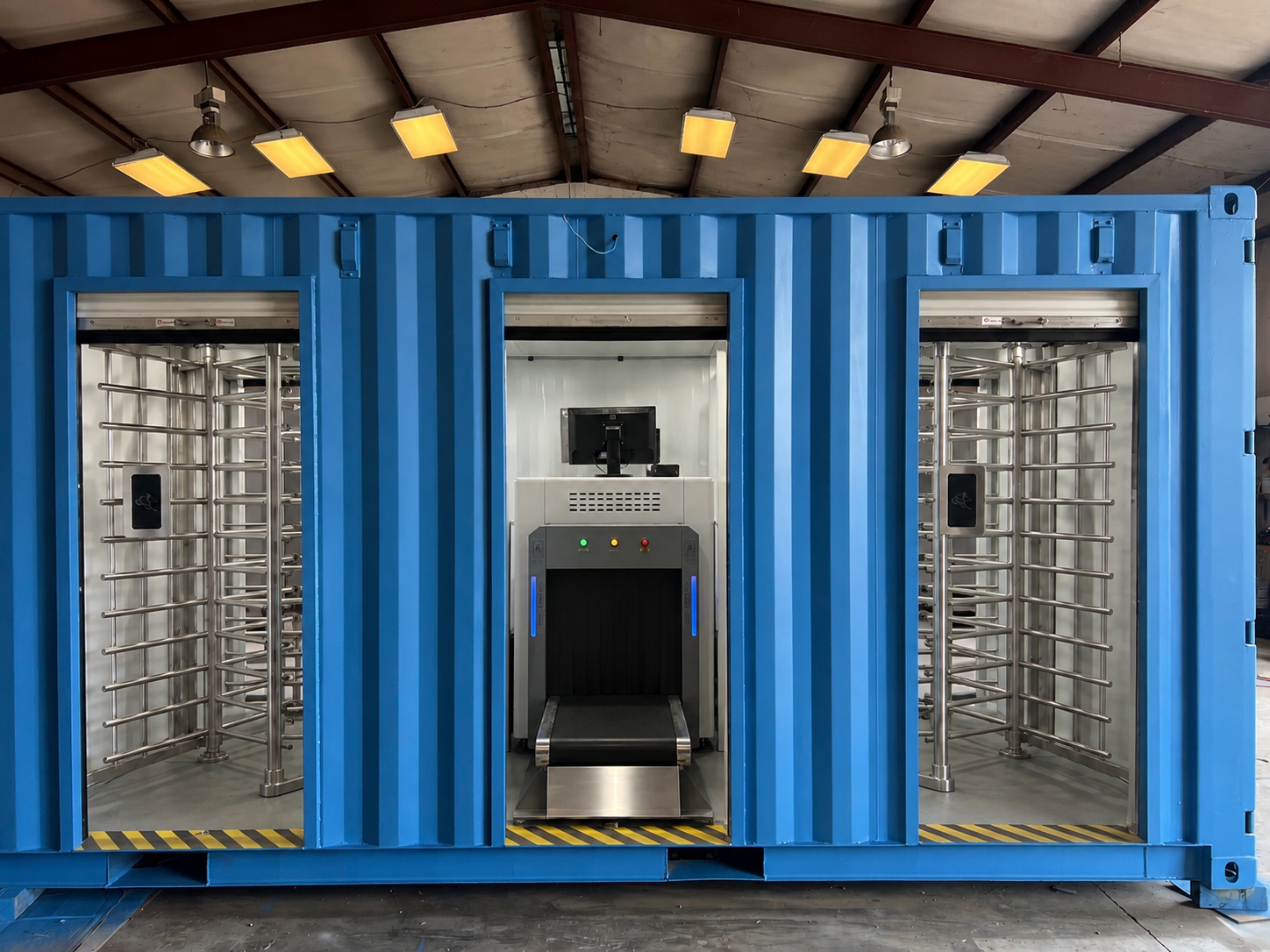 Completed container security checkpoint with X-ray machine and turnstiles — ready for site deployment