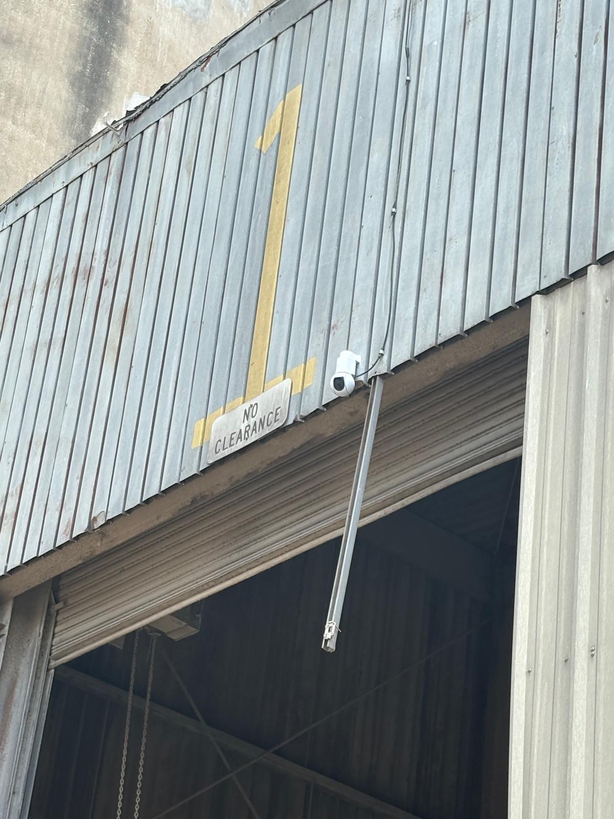 Ubiquiti UniFi G6 PTZ camera mounted above bay door of grain silo