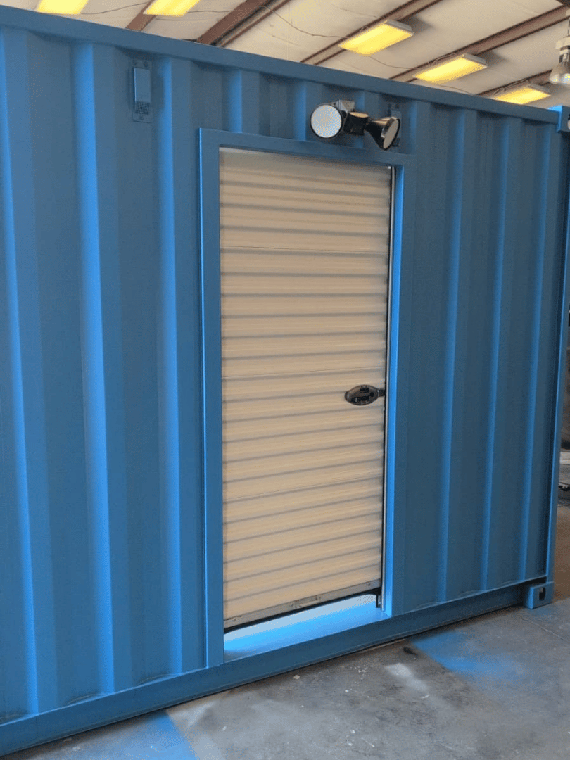 Closed entrance of custom 10-ft container turnstile checkpoint