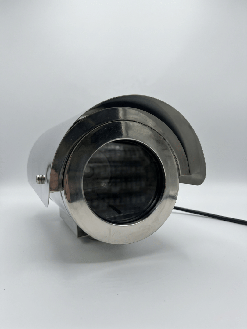 Close-up of the custom explosion-proof Verkada bullet camera housing model 2MEXH-3213, showing the clear tempered glass viewing port