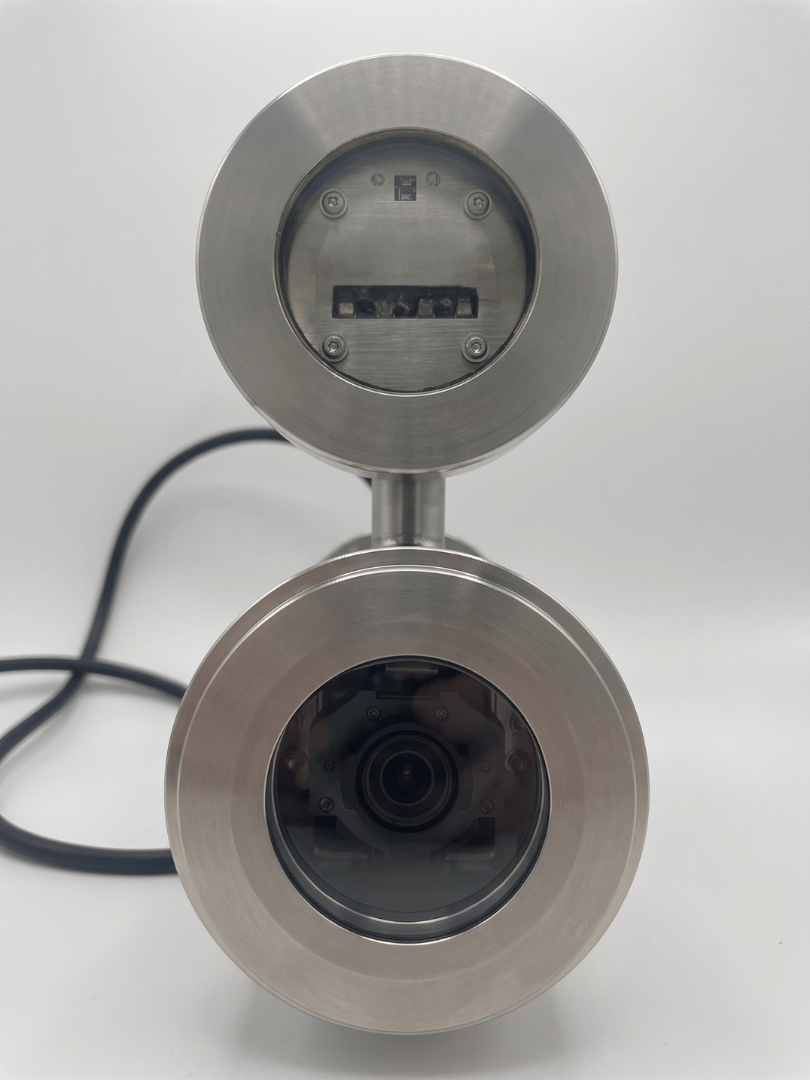 Direct front view of the custom explosion-proof Verkada bullet camera housing 2MEXH-2666 showing optical alignment and separate top IR illuminator window