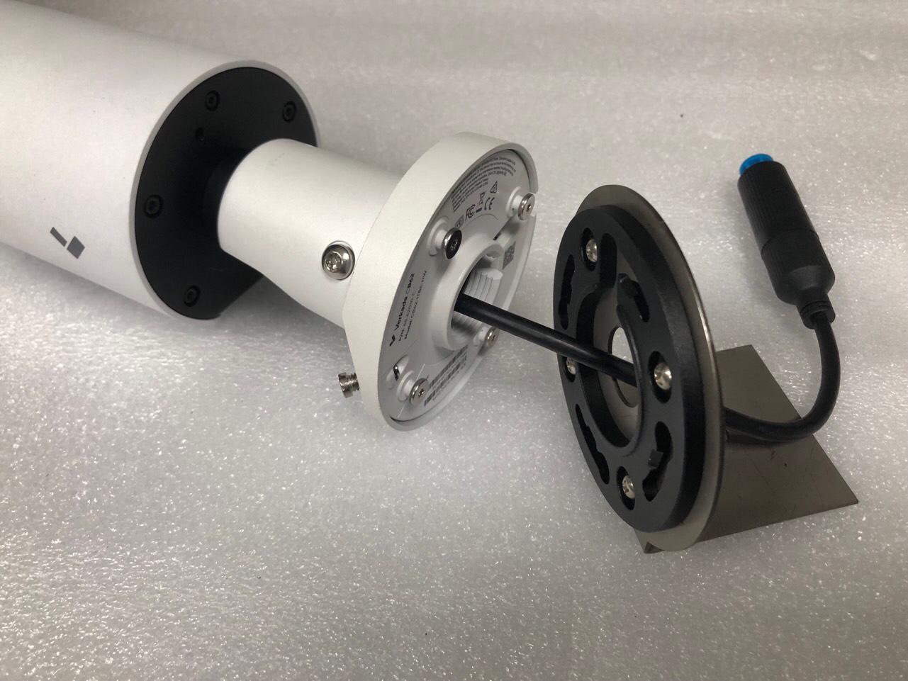Installing a custom internal adapter mounting plate and cable pass-through onto the base of a Verkada CB62-E bullet camera